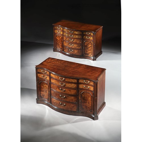 A Pair of George II Mahogany Serpentine Commodes Attributed to Wright and Elwick